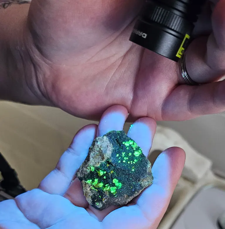 UV light shines on rock fluorescent colors